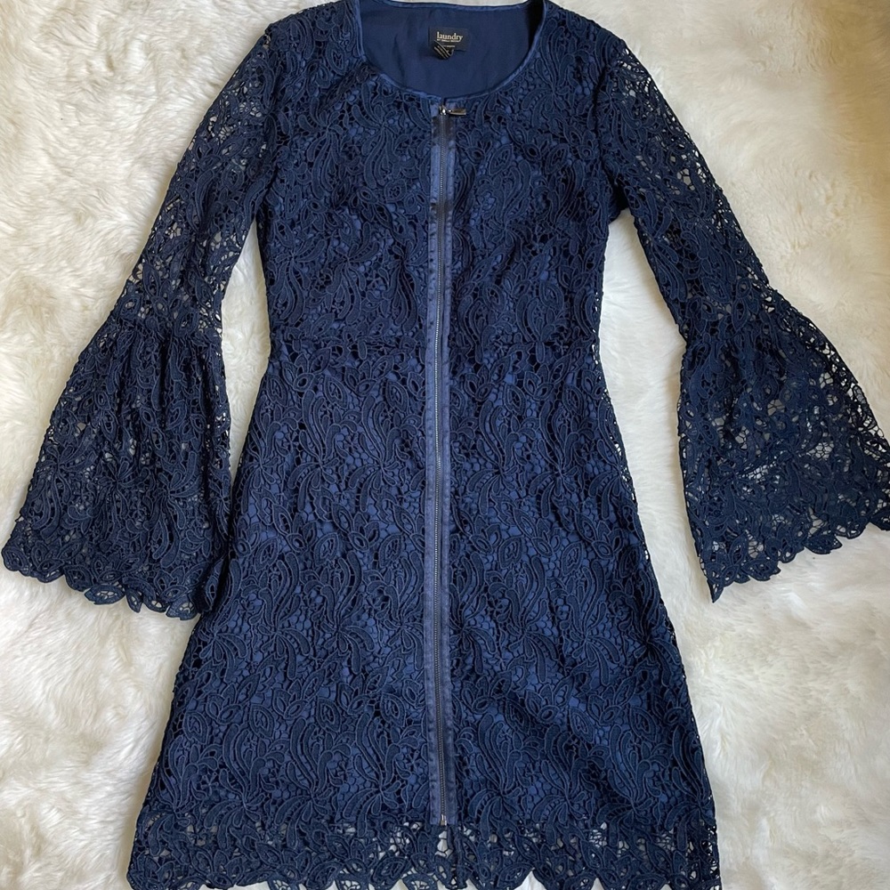 Navy Blue Lace dress.Bell Sleeves. Length 39 inches and underarm across 18.